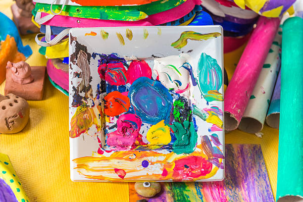 image of abstract drawing on the canvas with oil paint