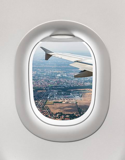 istock Looking out the window of a plane 547409838
