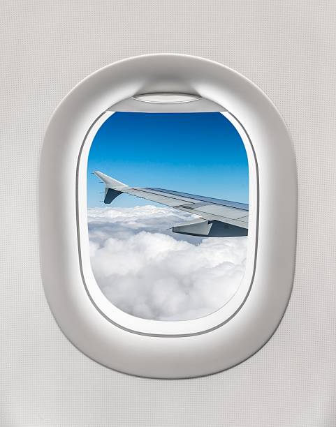 istock Looking out the window of a plane 547409868