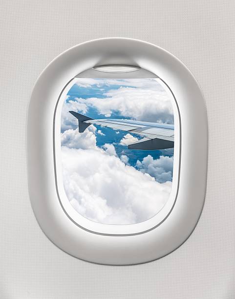 istock Looking out the window of a plane 547409988