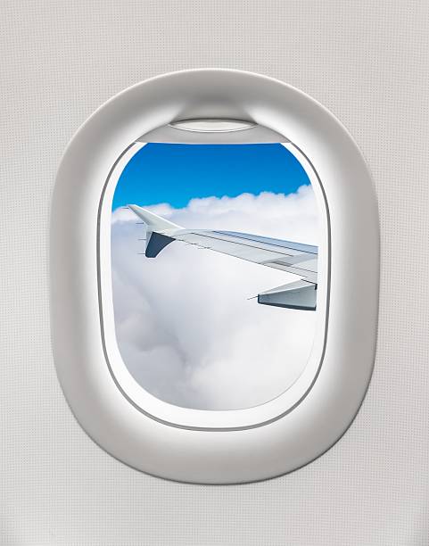 istock Looking out the window of a plane 547410038