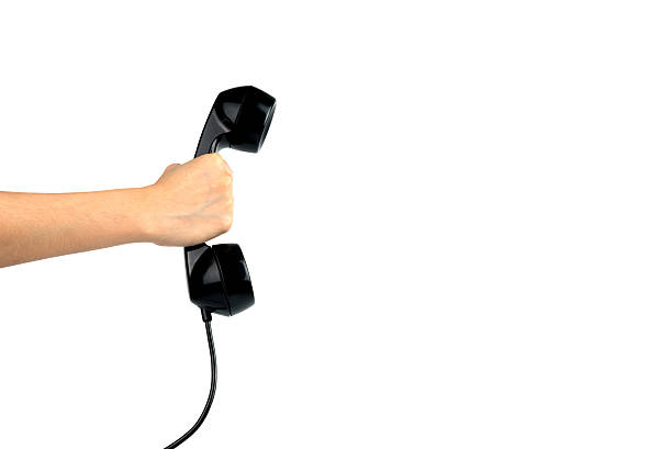 istock Hand holding vintage phone 547410738