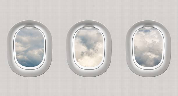 istock Looking out the windows of a plane to a clouds 547411132