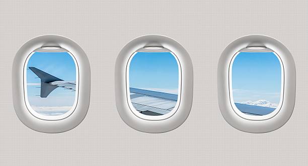 istock Looking out the windows of a plane 547411242