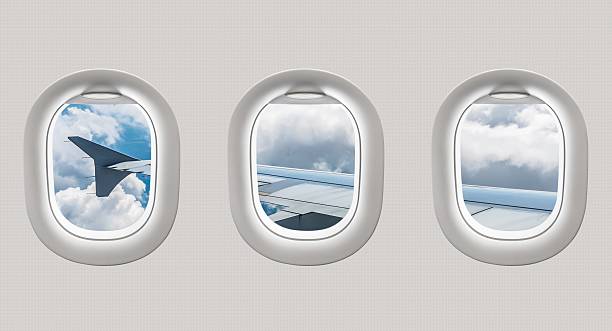 istock Looking out the windows of a plane 547411266