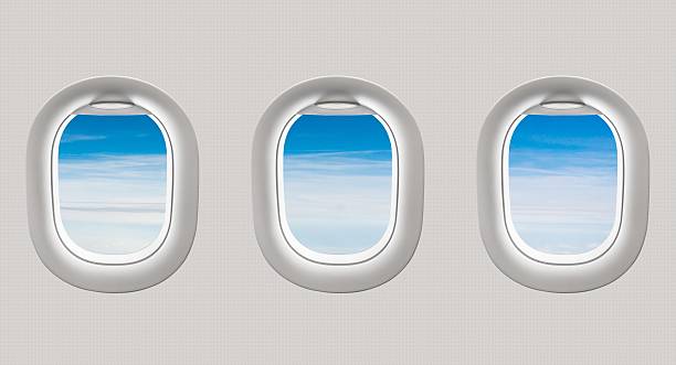 istock Looking out the windows of a plane 547411454