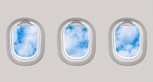 istock Looking out the windows of a plane 547411484