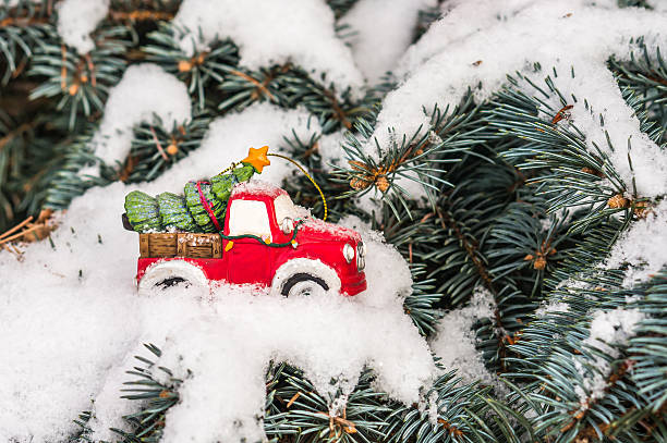 istock Christmas tree on toy car 547411760