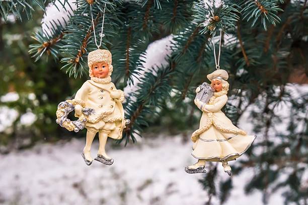 istock Christmas tree decorated with boy and girl 547412822