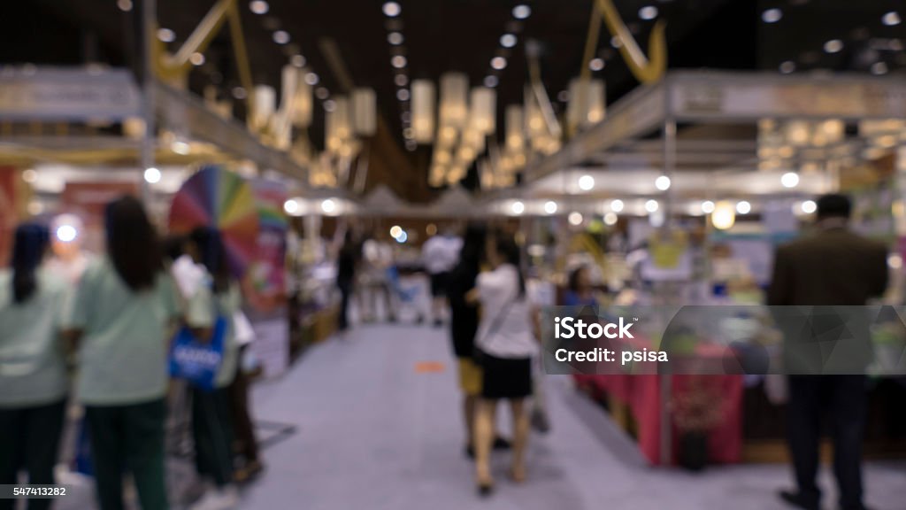 people shopping in exhibiton trade fair - blur people shopping in exhibiton trade fair - blur for use as background Tradeshow Stock Photo