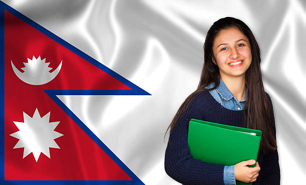 teen student lächelnd über nepalesische flagge - adolescence flag university people stock-fotos und bilder