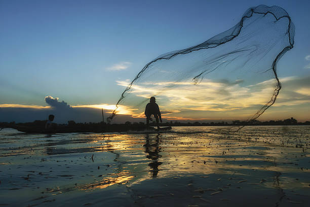 istock Traditional Asian fishermen . 547415474