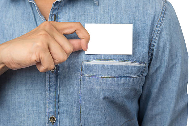 istock Man holding a blank business card 547416162