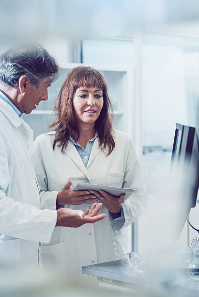 istock Scientists Discussing New Findings. 547418600