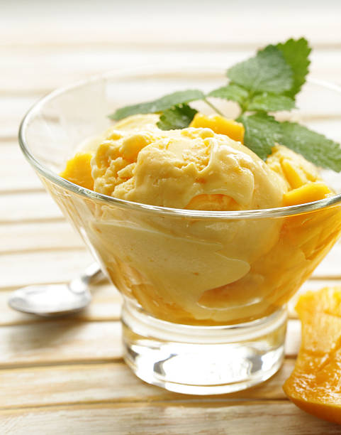 istock homemade natural orange ice cream with mango 547418998