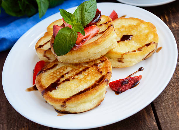 istock Rustic pancakes with fresh strawberries and chocolate 547419880