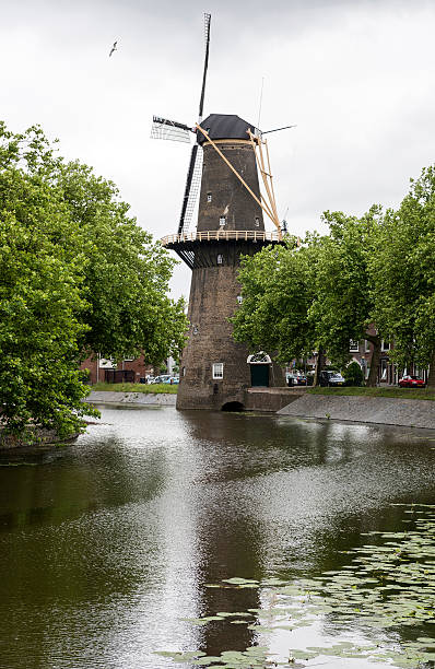 istock Traditional stone Windmill in Rotterdam 547422286