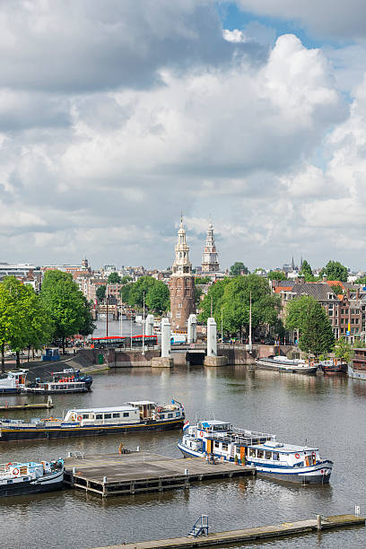 istock Amsterdam Oudeschans and Montelbaan Tower 547424410