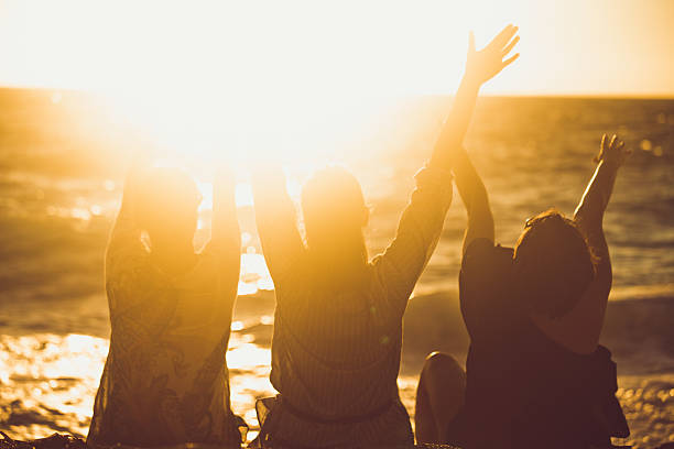 istock Three female friends having fun at the beach 547424610