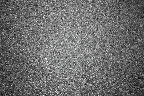 istock Photo of dark asphalted surface background 547425728