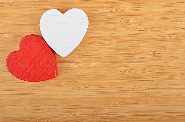 istock Heart on wooden background 547426596