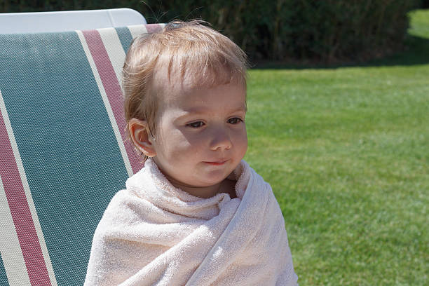 istock Little boy wrapped in towel 547428090
