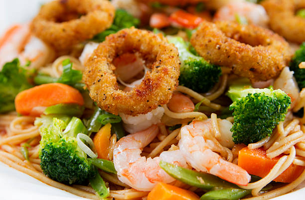 istock Fried calamari with Seafood pasta 547428106