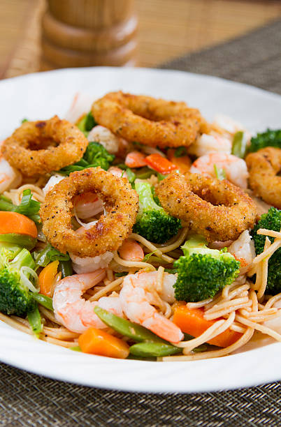 istock Fried calamari with Seafood pasta 547428142