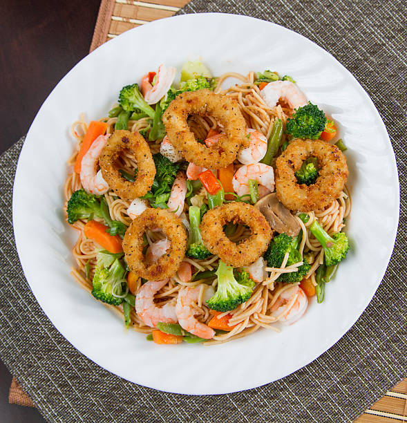 istock Fried calamari with Seafood pasta 547428160