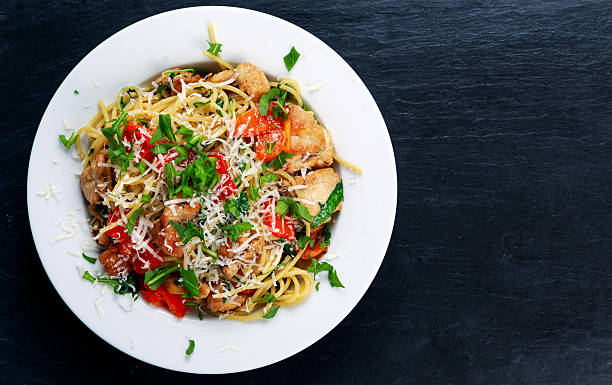 istock Italian Chicken Breast spaghetti, red pepper, Parmesan cheese, wild rocket. 547428418