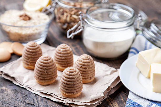 Traditional bee nest cake on wooden background