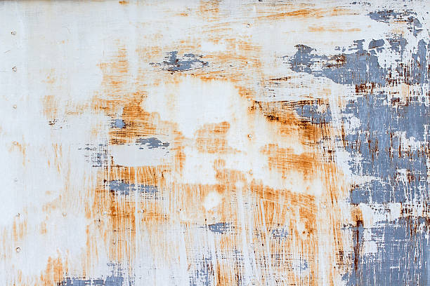 istock background of peeling paint and rusty old metal 547430578