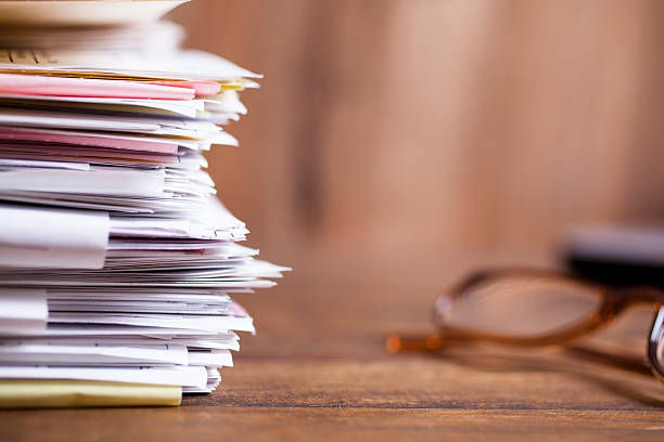 istock Large stack of files, paperwork. Close-up. Desk, office. Nobody. 547431078