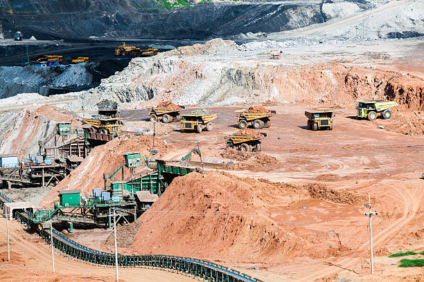 istock Part of a pit with big mining truck working 547431742