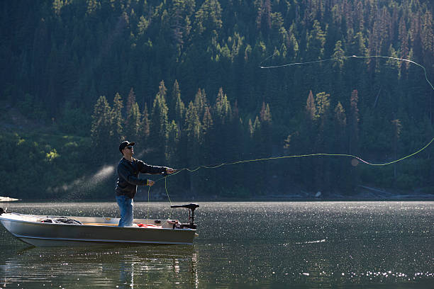 istock Fly fishing from a boat 547433234