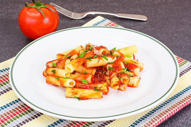 istock Pasta with Tomato Sauce Ketchup and Saffron 547434232