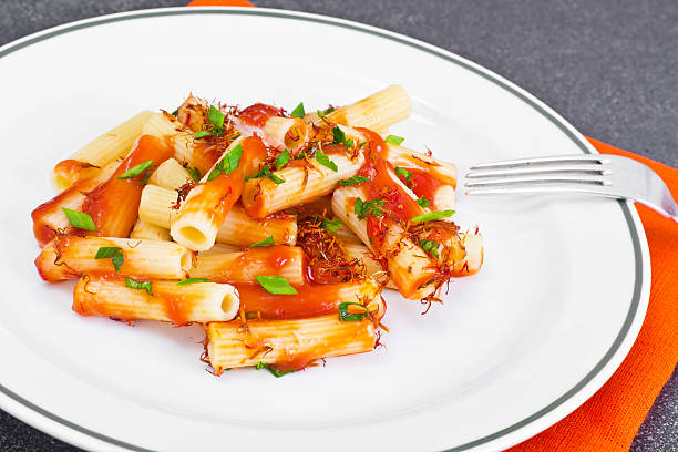 istock Pasta with Tomato Sauce Ketchup and Saffron 547434246