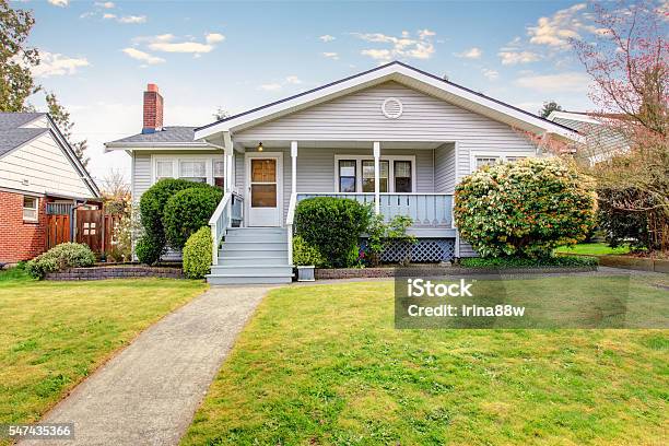 Beige Siding House Exterior With Covered Porch Stock Photo - Download Image Now - House, Outdoors, Facade