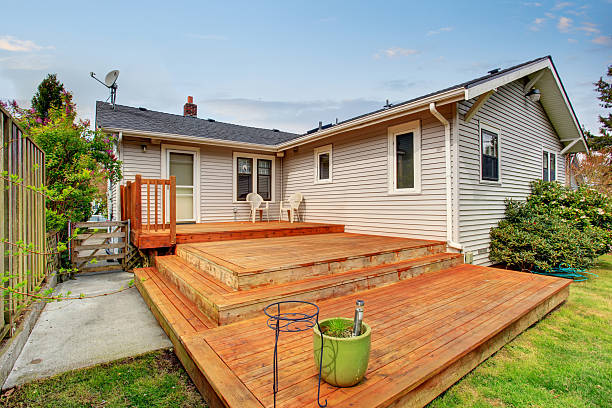 istock Picture of Large wooden back deck with two chairs. 547435480