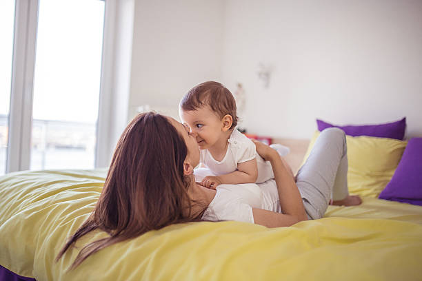 istock Kissing her baby 547435662