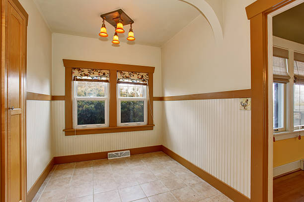 istock Small empty dining room interior in old craftsman style home 547435812