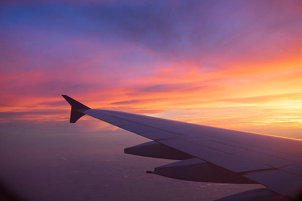 istock Sunset sky from the airplane window 547437818