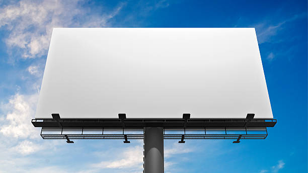 istock 3D illustration of blank white billboard against blue sky. 547438522