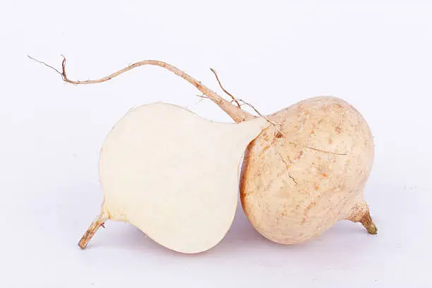 Yam bean ( Jicama ) is bulbous root vegetable fruit food on the white background