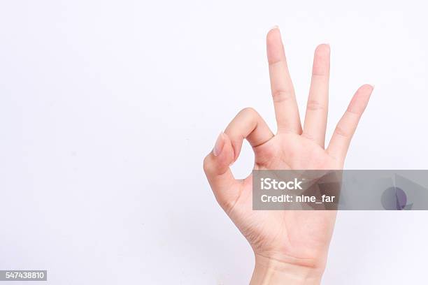 Hand Gesturing Sign Ok Okay Agree On White Background Stock Photo - Download Image Now