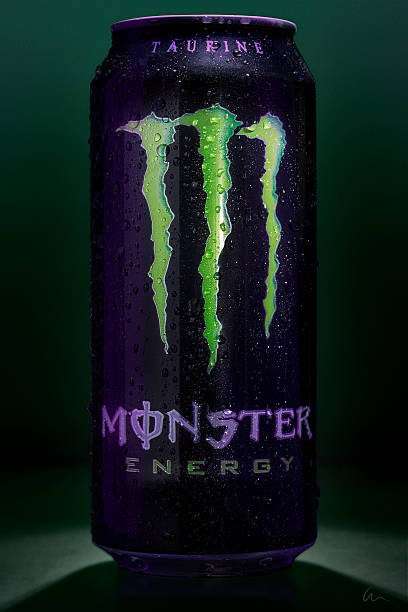 Cold Monster Energy Drink - Condensation Elyria, United States - July 14, 2016: A clean image that really pops. Classic Monster energy drink. monster energy stock pictures, royalty-free photos & images