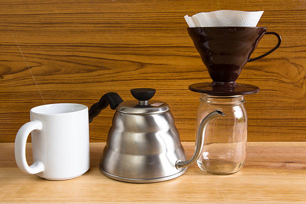 istock coffee drip glass pitcher on old wooden background 547439764