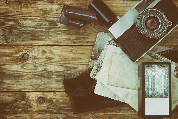istock vintage camera, film, photographs and flash 547439778