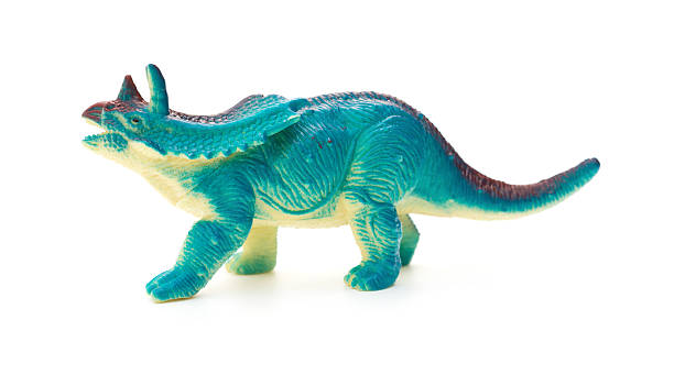 istock side view blue Pentaceratops on a white background 547440386