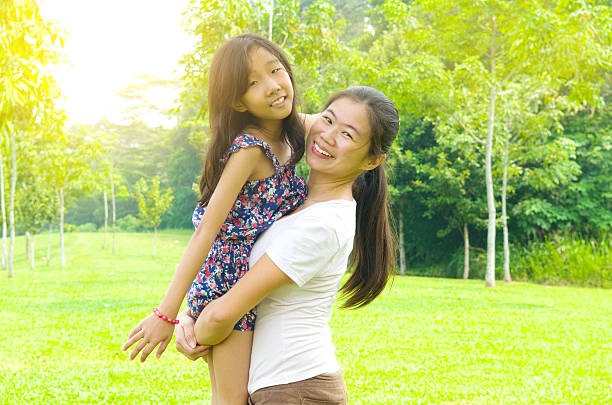 istock Happy asian family 547442274